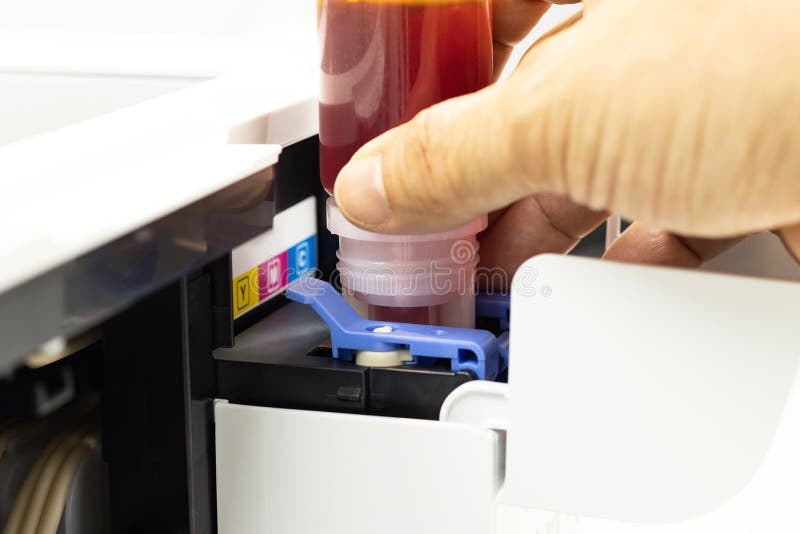 Technicians are Installing Setup the Ink and Insert Ink into the Fill