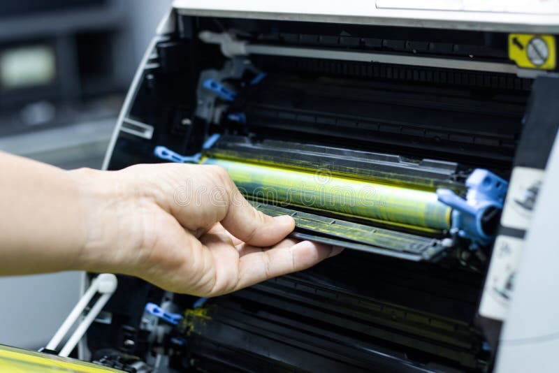 Technicians Replacing Toner in Laser Printer Concept Office Supplies