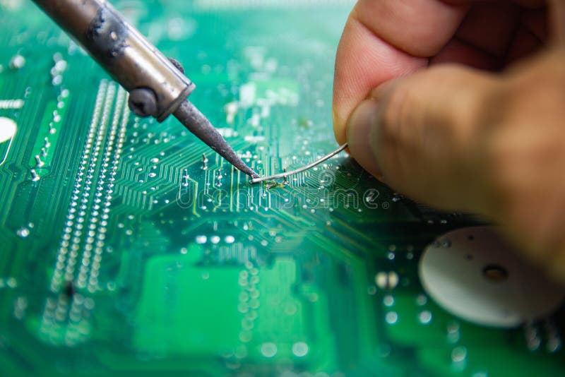 Technicians are Using a Soldering Iron for Repairing Electronic Stock Photo Image of parts