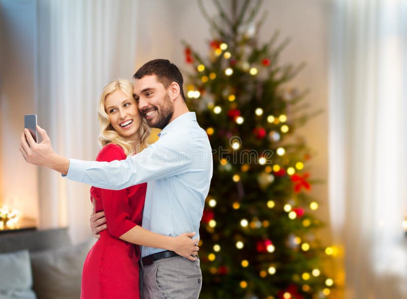 Couple Taking Selfie By Smartphone On Christmas Stock Image - Image of ...