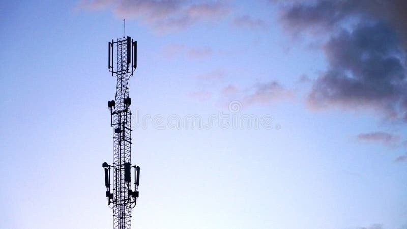 Technology on the top of the telecommunication GSM &#x28;5G,4G,3G&#x29; tower.Cellular phone antennas on a building roof.silhouette of Telecommunication mast television antennas. n. Technology on the top of the telecommunication GSM &#x28;5G,4G,3G&#x29; tower.Cellular phone antennas on a building roof.silhouette of Telecommunication mast television antennas. n