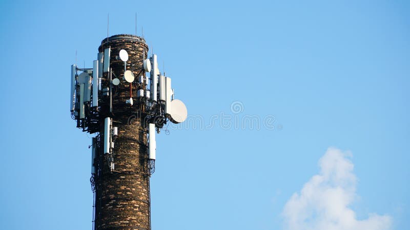 Technology on the top of the telecommunication GSM &#x28;5G,4G,3G&#x29; tower.Cellular phone antennas on a building roof.silhouette of Telecommunication mast television antennas. n. Technology on the top of the telecommunication GSM &#x28;5G,4G,3G&#x29; tower.Cellular phone antennas on a building roof.silhouette of Telecommunication mast television antennas. n