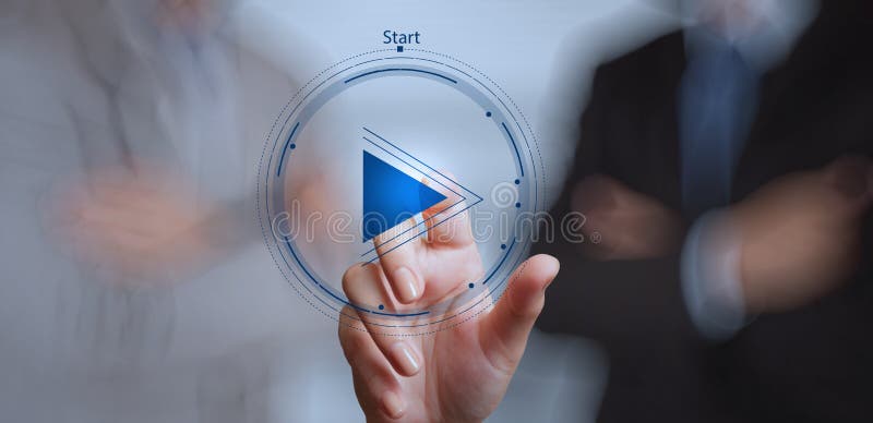 Hand press play button sign to start or initiate projects with his team as concept. Hand press play button sign to start or initiate projects with his team as concept
