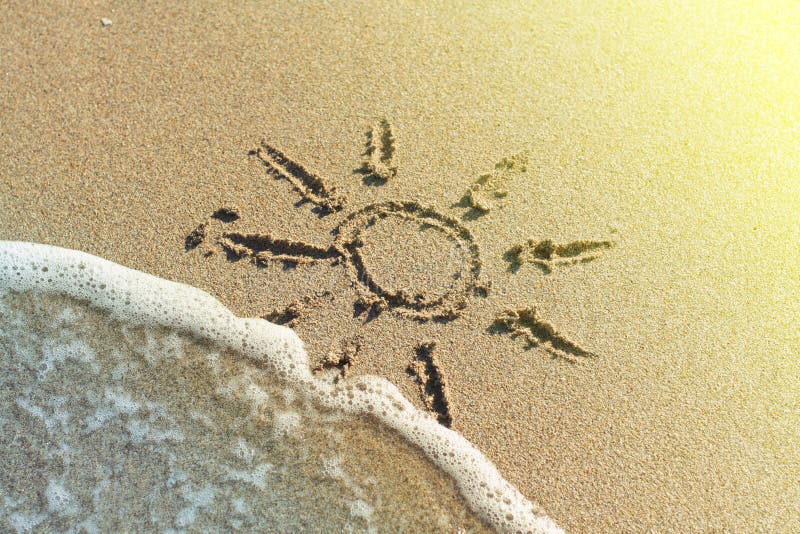 Sun drawing on the beach sand. Sun drawing on the beach sand