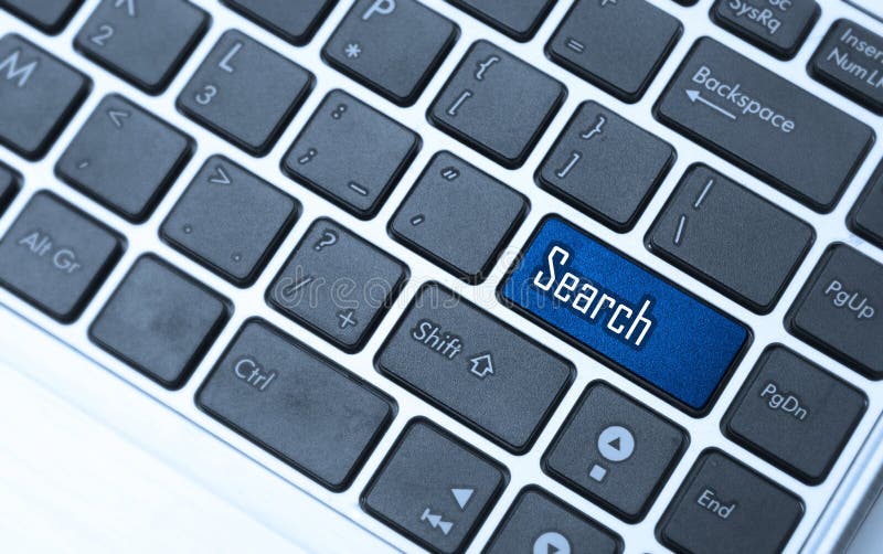 Teclado con llave de búsqueda fotografía de archivo libre de regalías Teclado con llave de búsqueda fotografía de archivo libre de regalías