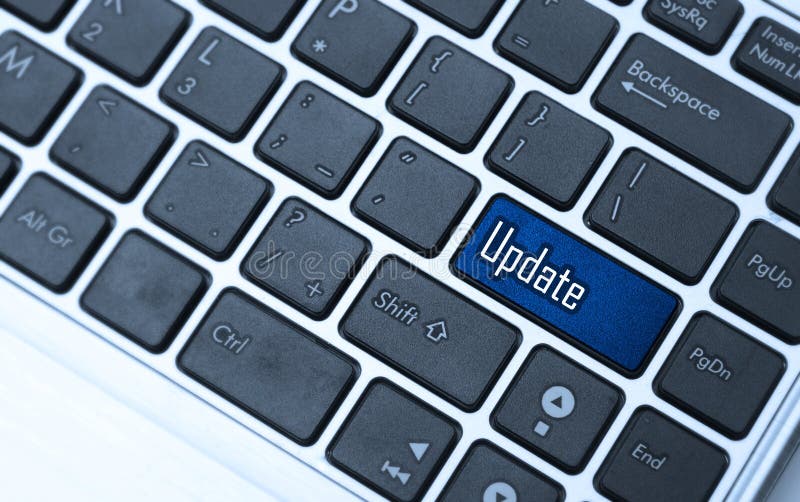 Teclado do caderno do computador com chave da atualização - backgrou da tecnologia fotos de stock royalty free Teclado do caderno do computador com chave da atualização - backgrou da tecnologia fotos de stock royalty free
