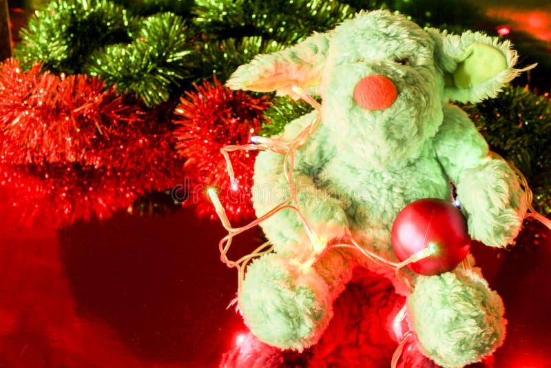 Teddy Bear Christmas Tree Balls, Lights and Garlands Stock Photo