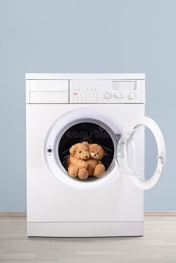 Teddy Bear Couple Hugging in Washing Machine Copy Space Stock Image