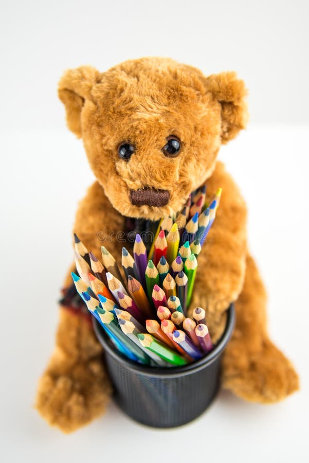 Teddy bear with pencils stock image. Image of office - 67320657