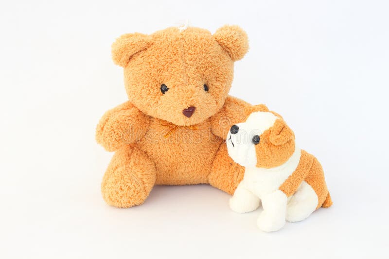 Teddy Bear und braune Hundepuppen, braune Ohren lizenzfreie stockfotografie Teddy Bear und braune Hundepuppen, braune Ohren lizenzfreie stockfotografie