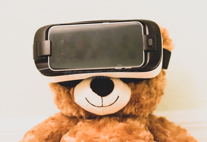 Teddy Bear wearing a virtual reality headset. stock photos Teddy Bear wearing a virtual reality headset. stock photos