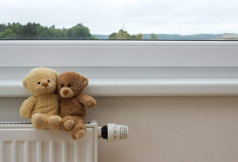 Teddy bears on the heater