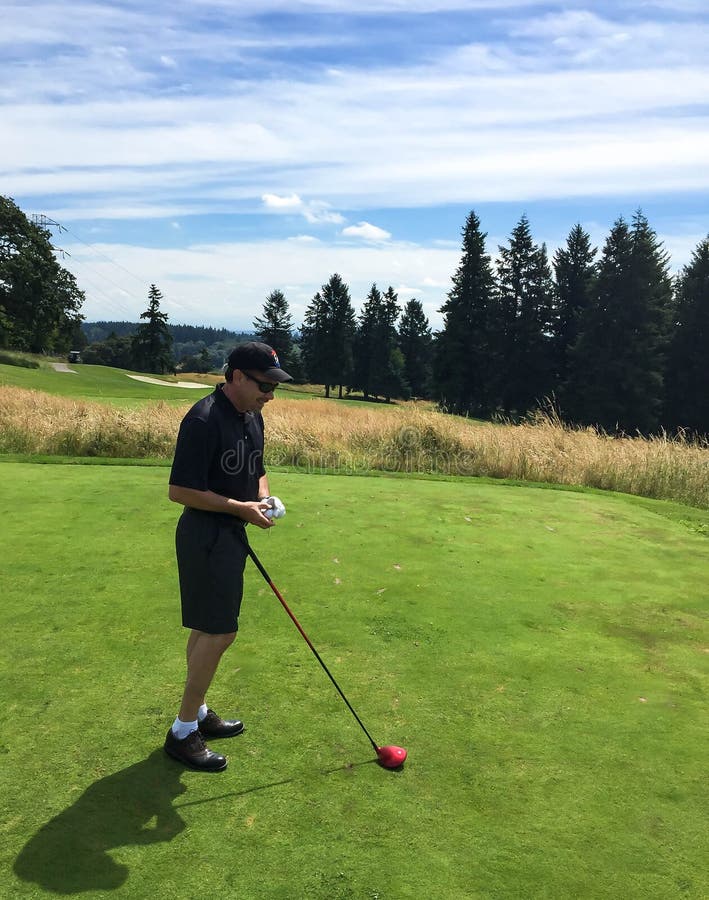 Teeing Off at the Golf Course Stock Photo - Image of teeing, sunglasses ...