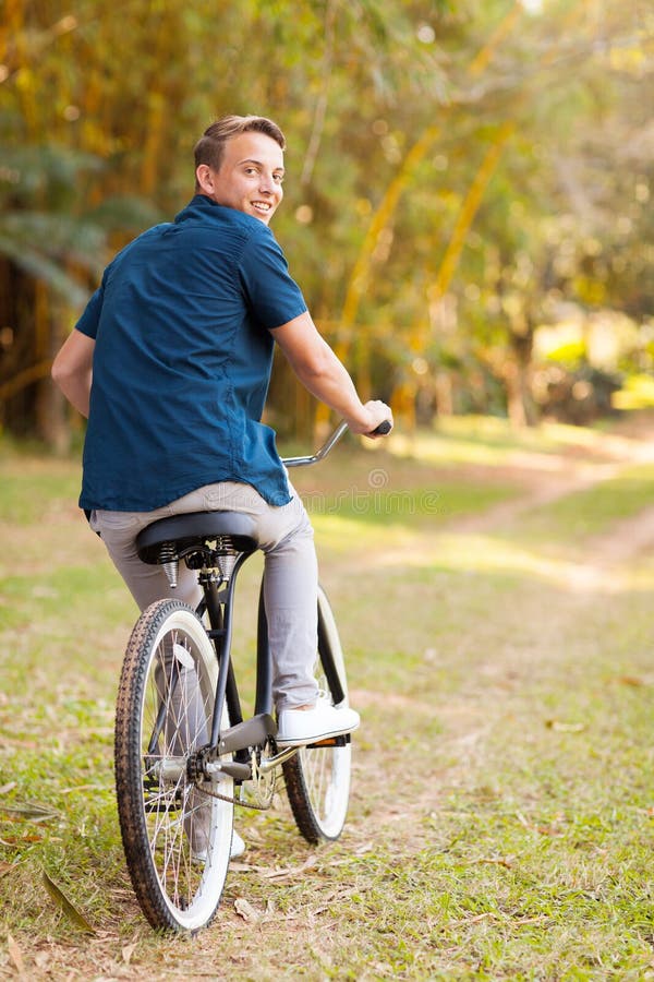 Teen boy bicycle stock photo. Image of portrait, back 32396280