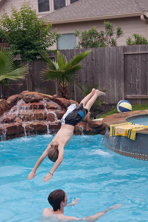 Teen Boy Swimming In A Pool Stock Photo - Image of 