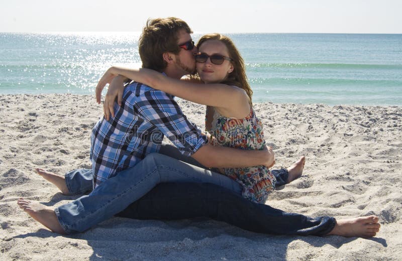 Teen couple on the beach