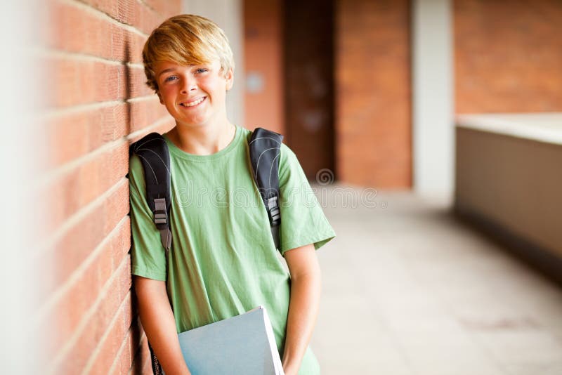 Happy teen student in school. Happy teen student in school