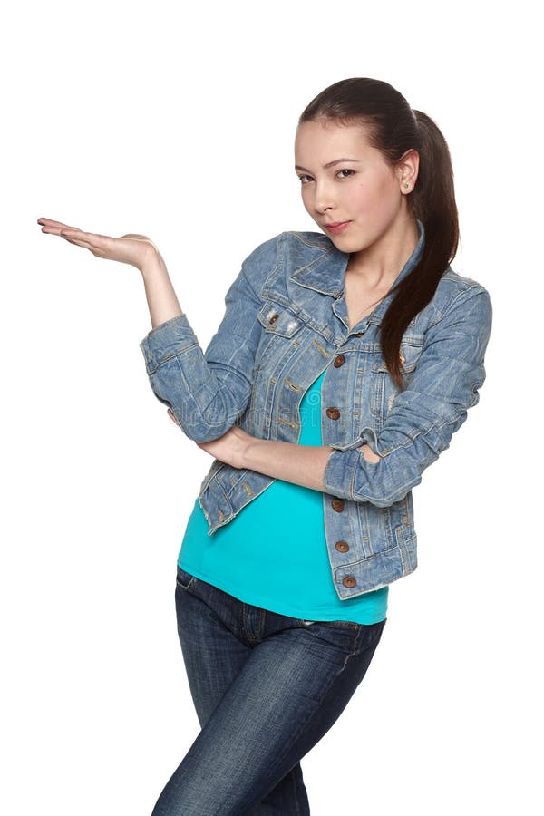 Teen female holding blank copy space on the palm