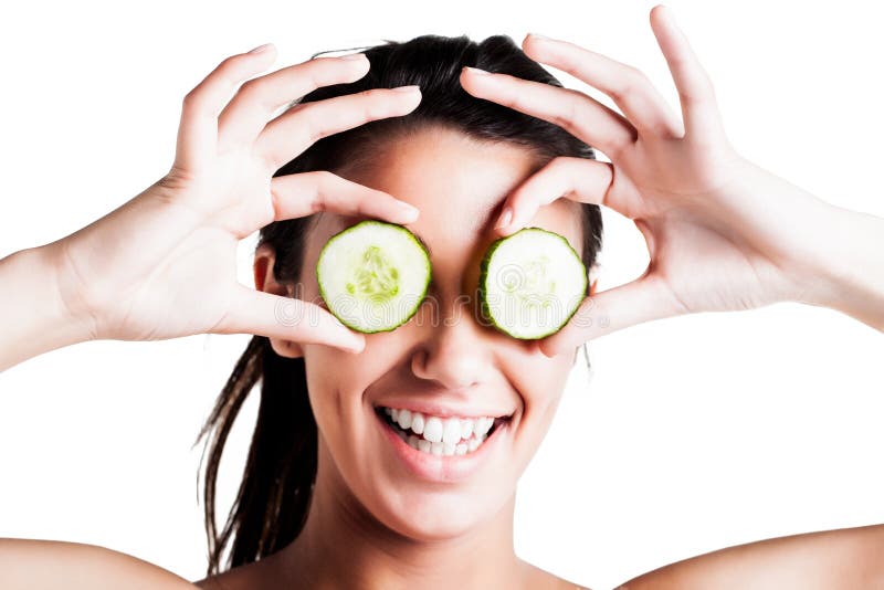 A Teen girl with cucumbers on eyes