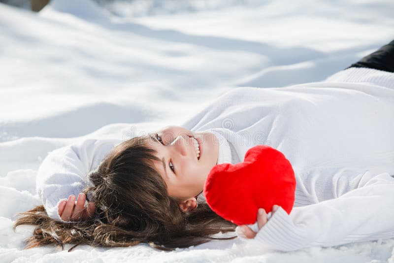 Teen girl heart in his hands