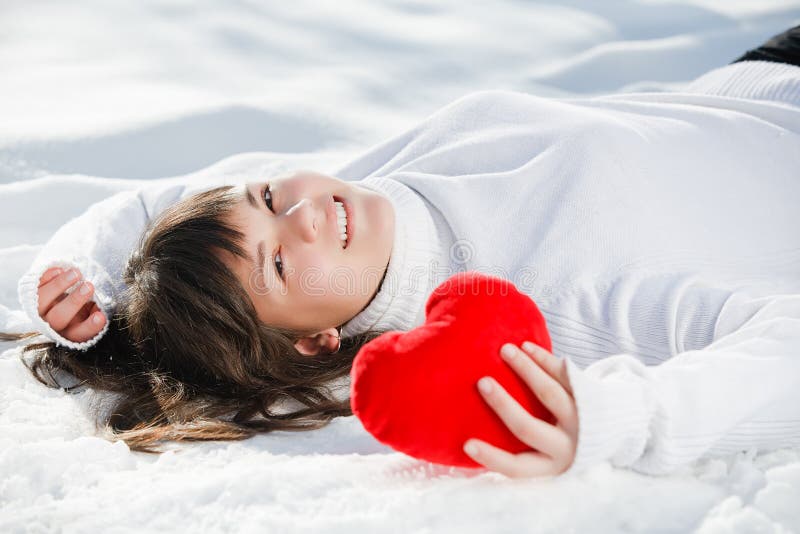 Teen girl heart in his hands