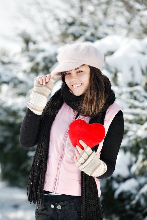 Teen girl heart in his hands