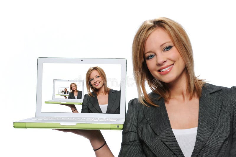 Teen girl holding laptop computer