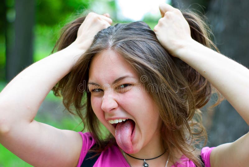 Teen girl making a silly face