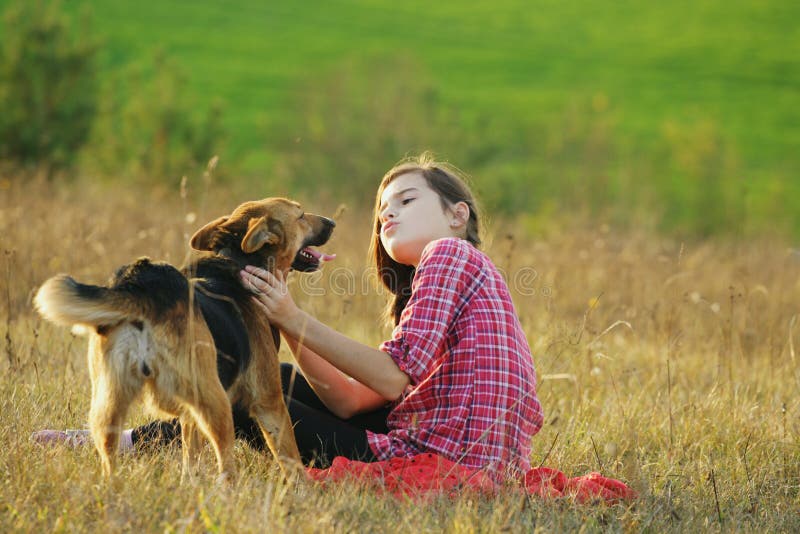 Teen Girl Playing with Her Dog Stock Photo - Image of love, autumn: 34751208