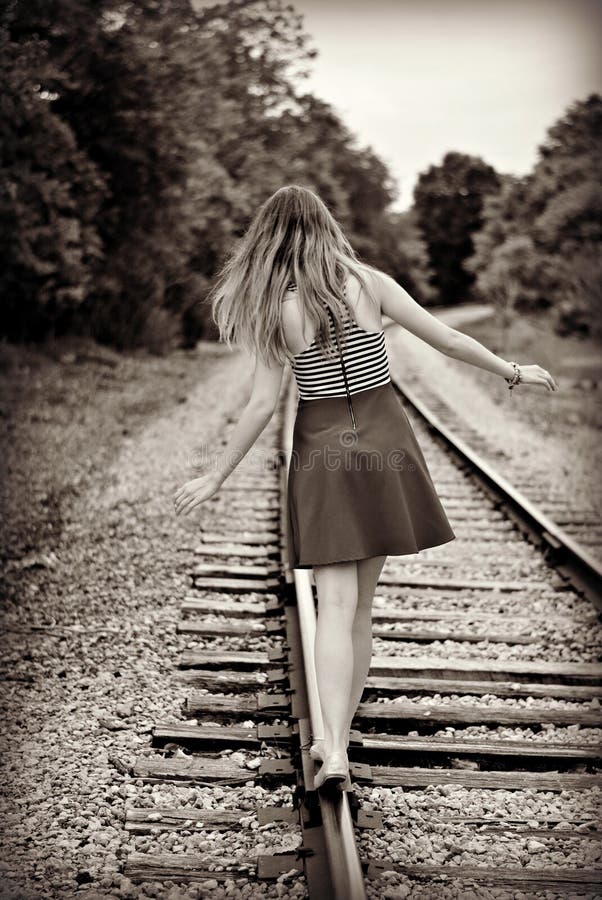 Teen Girl Walking Away on a Train Track Stock Image - Image of dreams ...