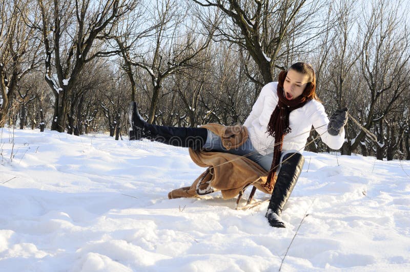 Teen having accident with sledge