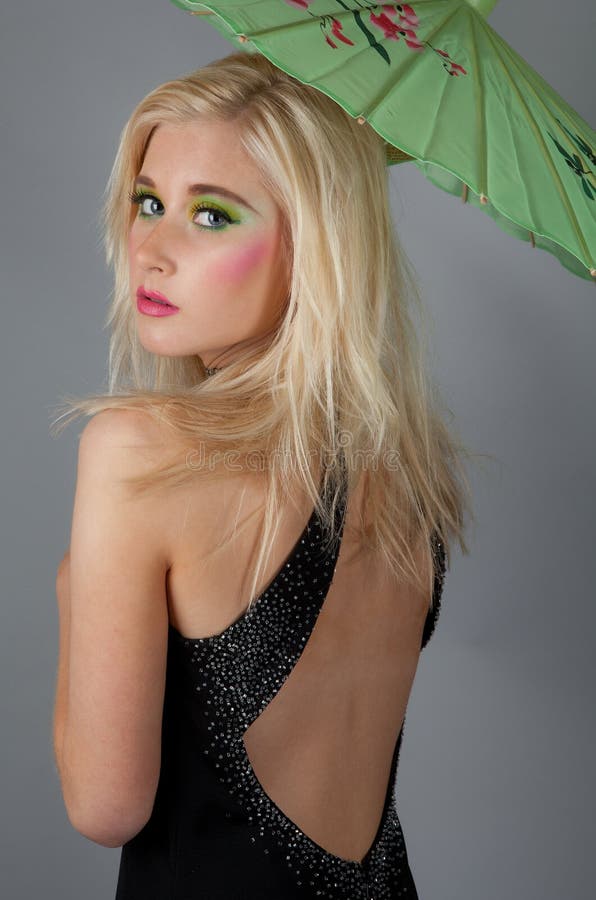 Teen With Parasol and Matching Makeup