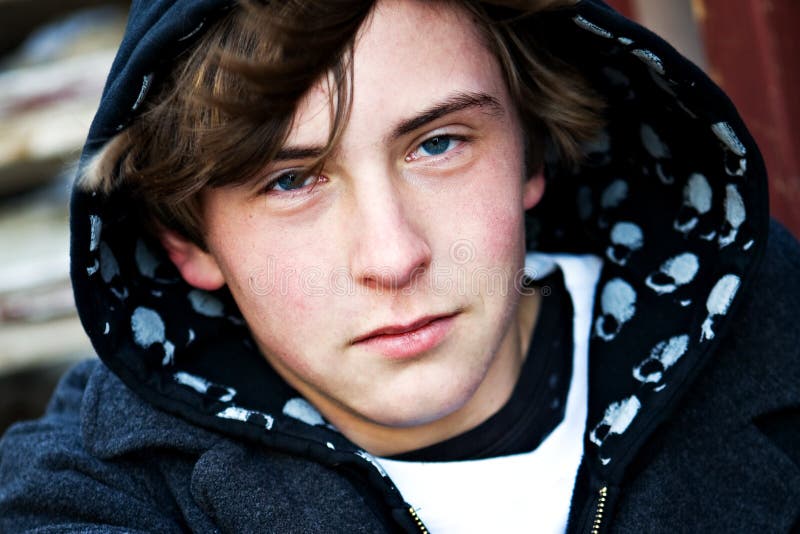 Teen portrait with hoodie closeup