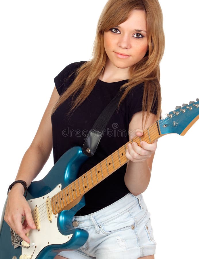 Teen rebellious girl playing electric guitar