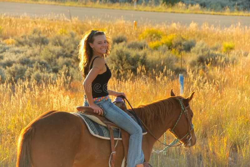 Teen riding stock image photo