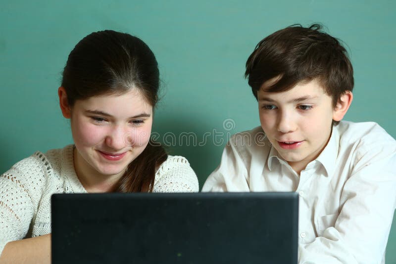 Teen Siblings Brother And Sister In Massage Chair Stock