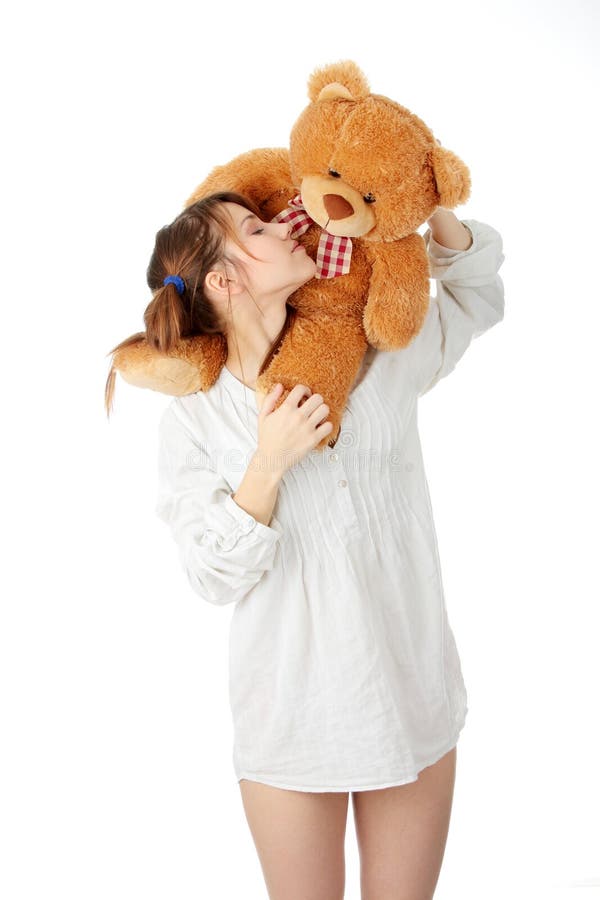 Teen with teddy bear