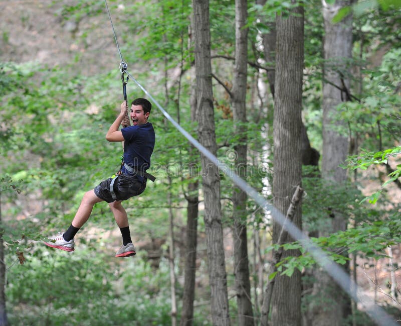 Teen Zipline stock photo. Image of crazy, scream, outdoor 34378548