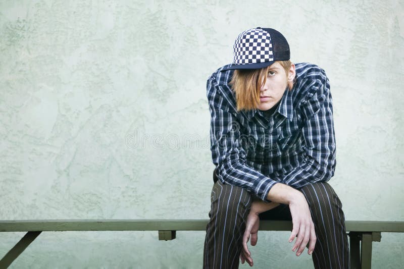 Teenage Boy on a Bench