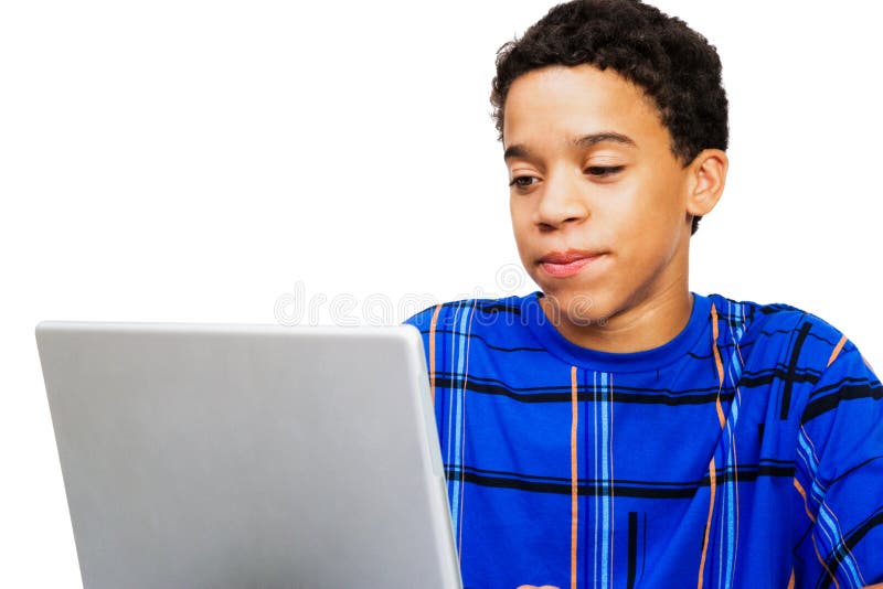Teenage Boy Looking At Laptop