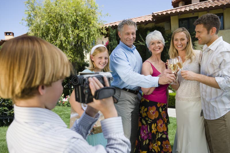 Teenage Boy Recording Happy Moment Together