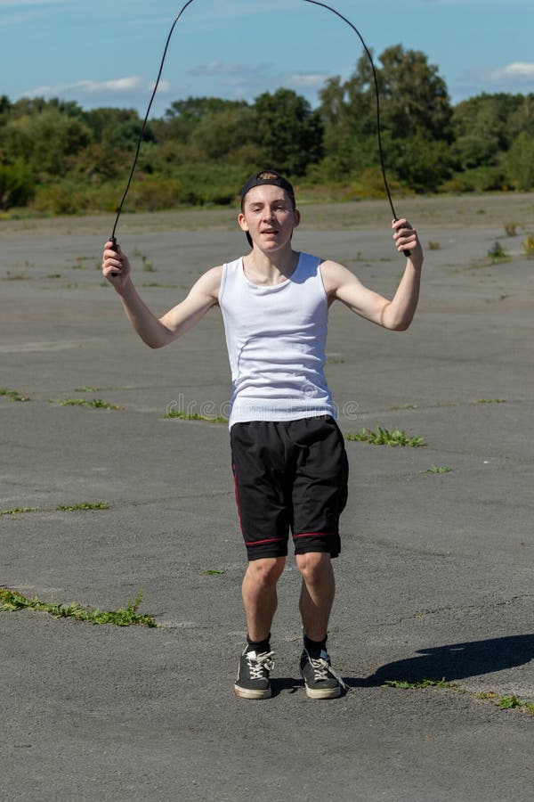 Teenage Boy Skipping with a Skipping Rope Stock Image - Image of portrait,  outdoor: 288418425