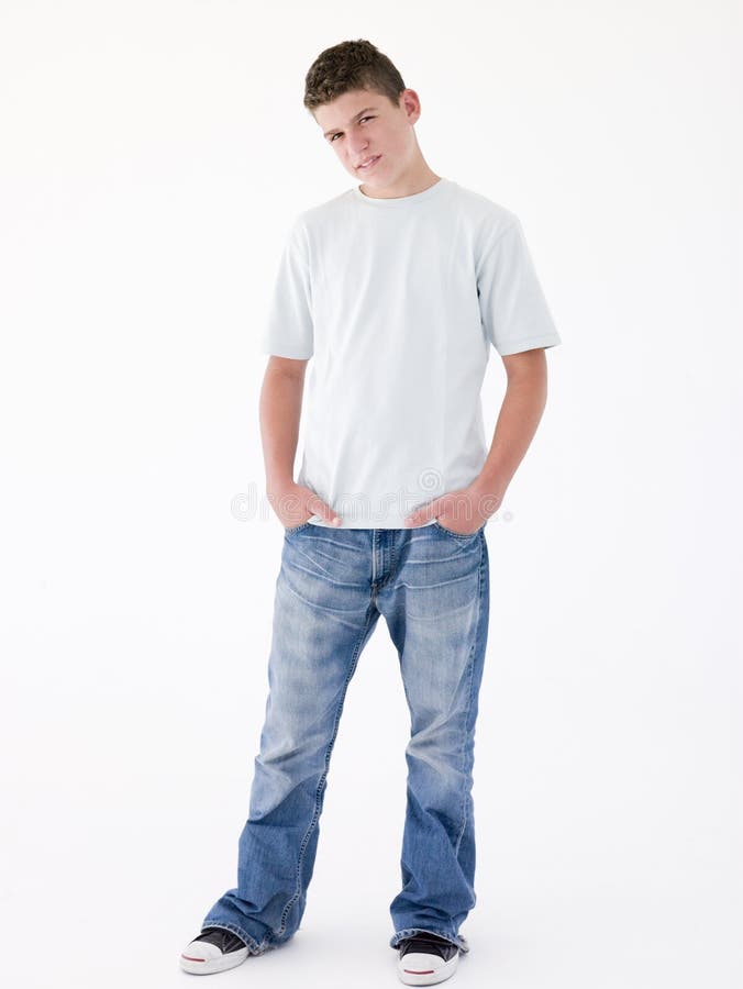 Teenage Boy Standing with Hands in Pockets Stock Image - Image of ...