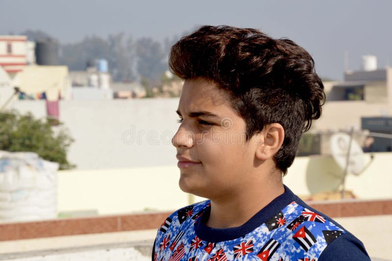 Teenage Boy Standing on House Roof for Taking Sunbath. Stock Image - Image of indian, face: 113880749 Teenage Boy Standing on House Roof for Taking Sunbath. Stock Image - Image of indian, face: 113880749