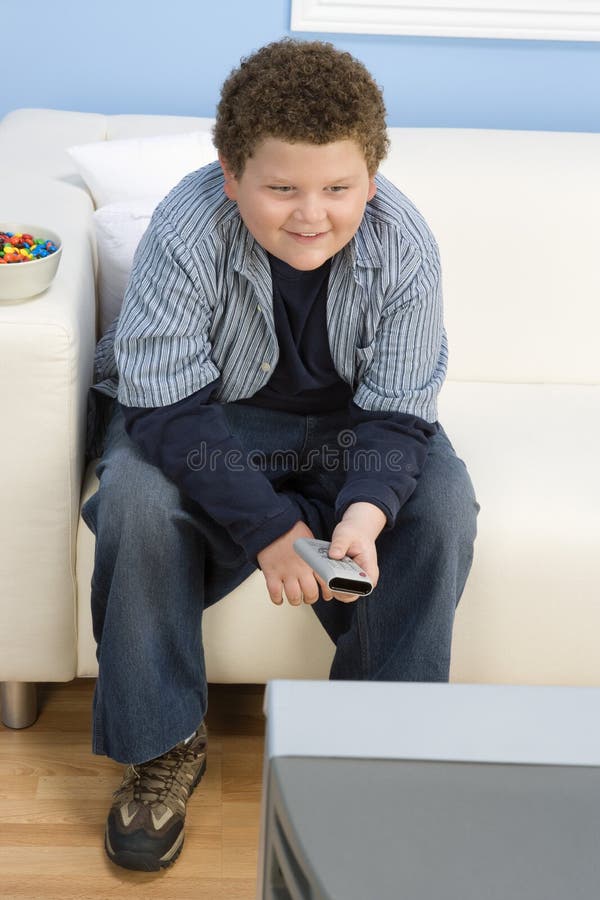 Teenage Boy Watching Television royalty free stock photos Teenage Boy Watching Television royalty free stock photos