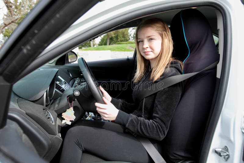 Teenage driver in car