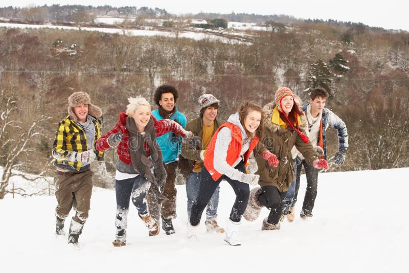 Teenage Friends Having Fun In Snow stock photography Teenage Friends Having Fun In Snow stock photography