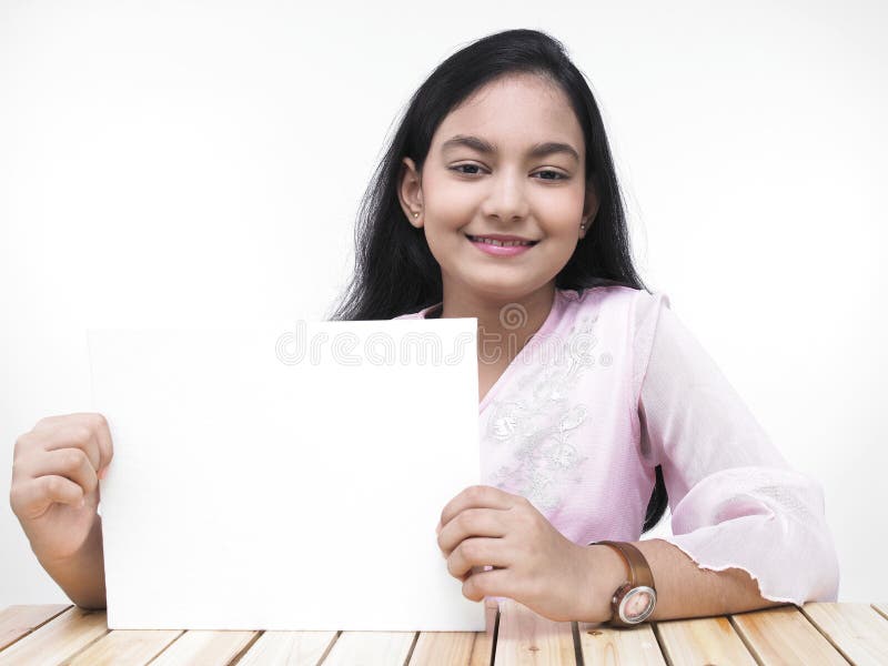 Teenage girl with a blank placard