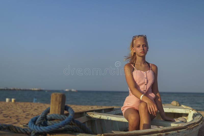 Teen Blond Girl In A Bikini Stock Photo, Picture and Royalty Free Image.  Image 21572799.