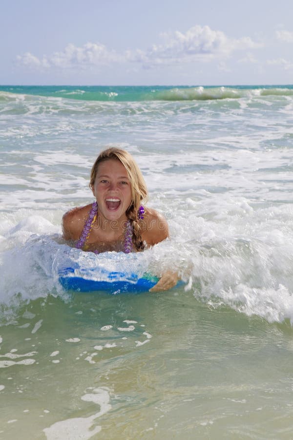 Teenager In Yellow Bikini Taking A Shower Stock Image